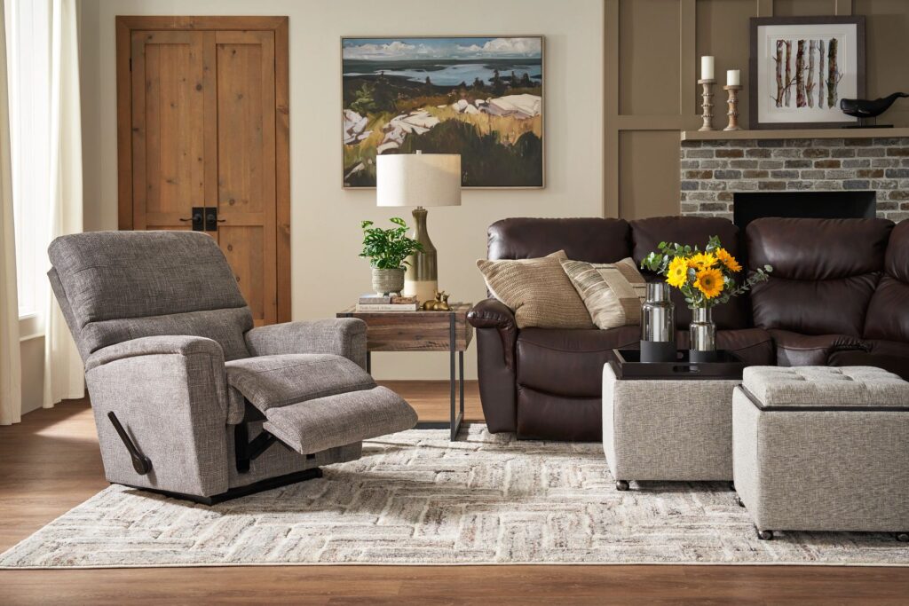 A living room setting with a sofa and reclining chair