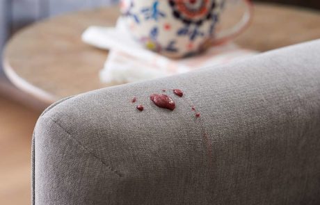 Stain resistant fabric on couch with berries spill